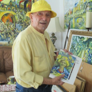 Fine Artist Ivo David with his book of poems Memories of an Artist.